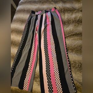 Cross over front nylon dress pants.